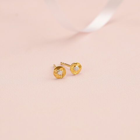 Shimmering Twist 14 Kt Gold and Diamond Stud Earrings