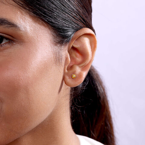 Shimmering Twist 14 Kt Gold and Diamond Stud Earrings