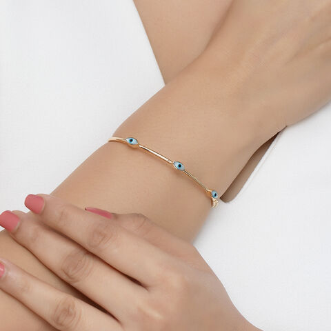 Cosmic Elegance Evil Eye Gold Bangle